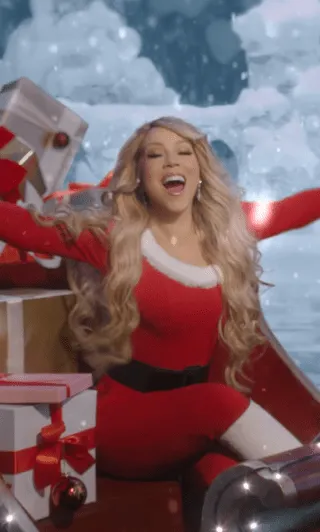 Mariah Carey Transforms into Morticia Addams to Kick Off Holiday Season